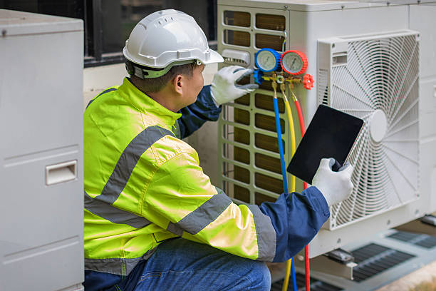Professional Air Duct Cleaning technician working in Armonk, NY